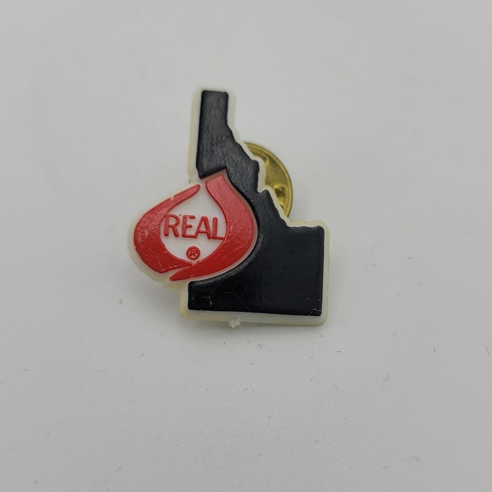 IDAHO Real Cheese Advertising State Outline Lapel Pin Travel Souvenir